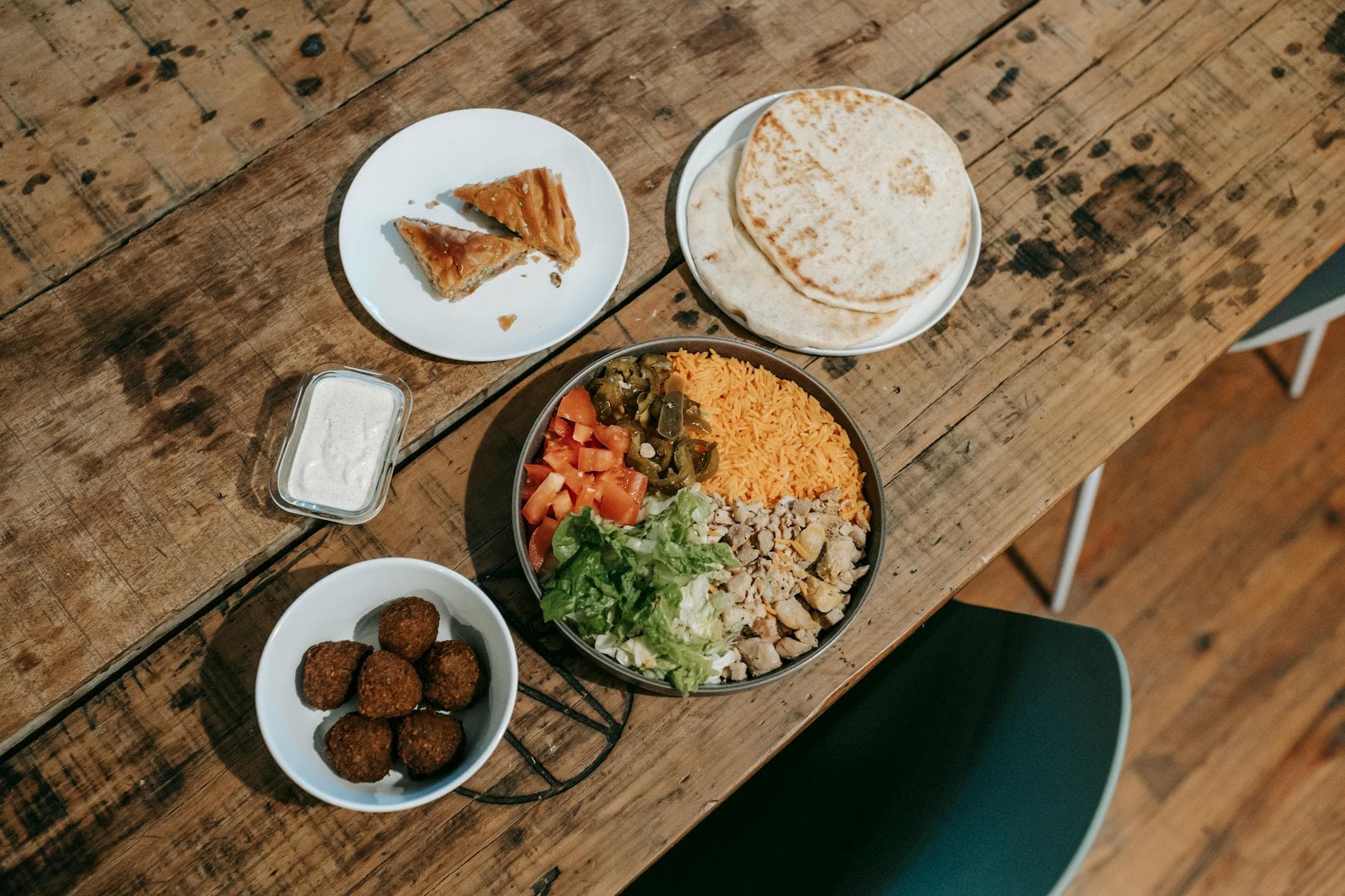 Overhead view of Indian dishes spread on a table